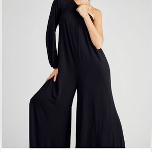 Free People FP Beach Sunday Stroll Jumpsuit in black. Size small. Like new!